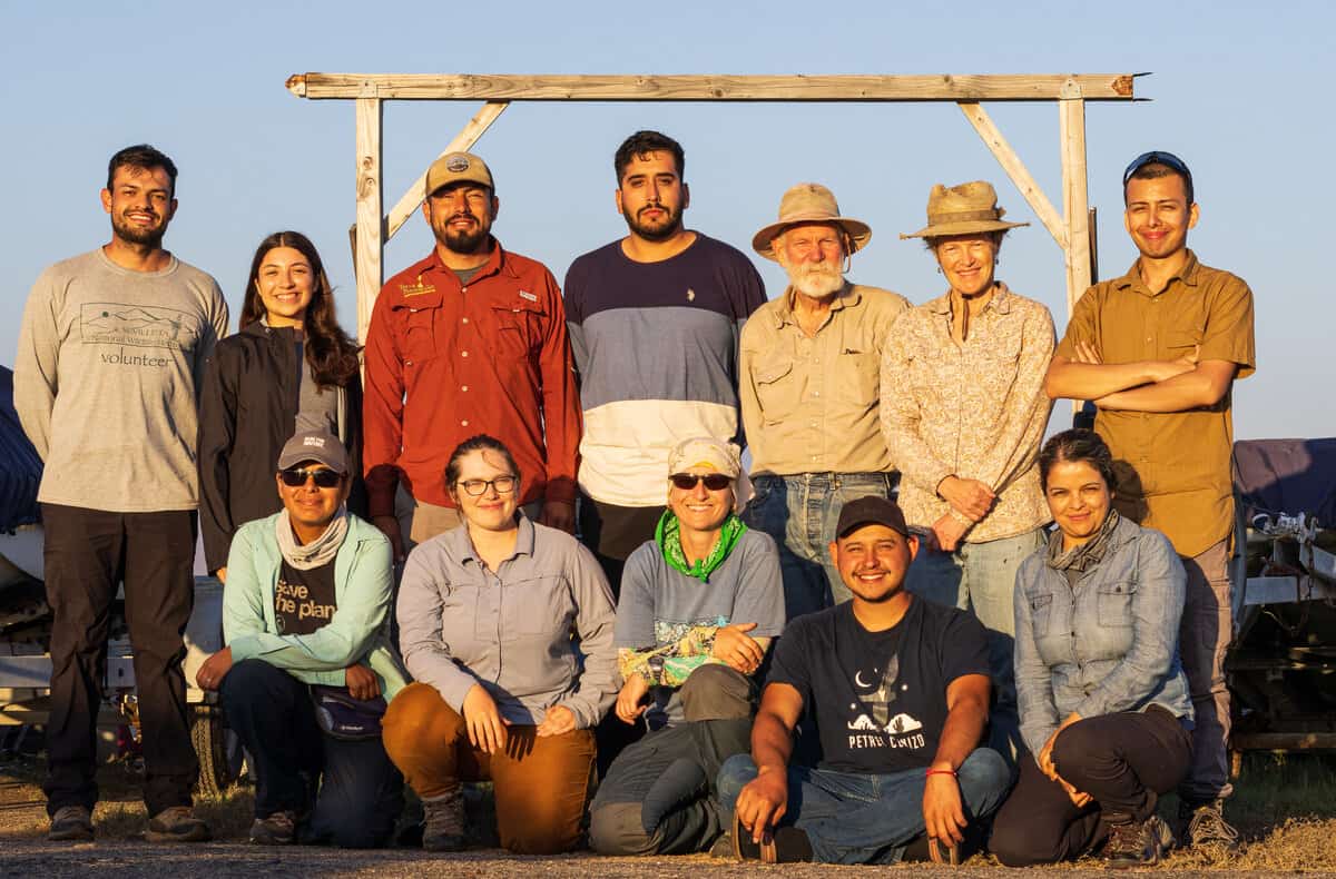 The group of volunteers and researchers pose after a day in the field.