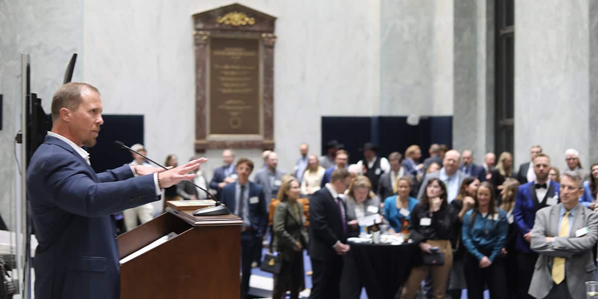 Jon Hayes accepts award